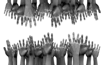 This is a photo of hands reaching