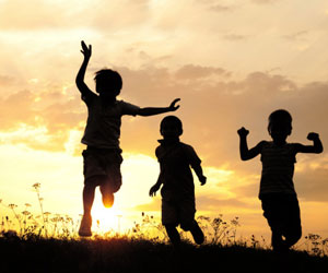 This is a photo of children running.