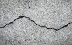 A crack runs across a cement floor