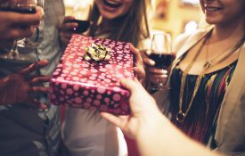 A group of friends exchanging gifts