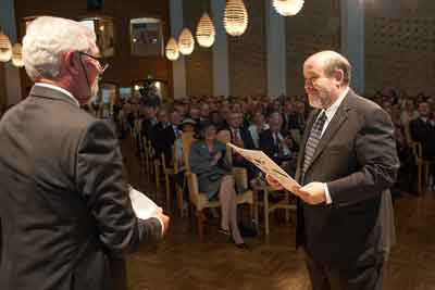 David C. Rubin (right) receives an honorary degree from Dean Svend Hylleberg of Aarhus University. Queen Margrethe II of Denmark is seated in the front row. 