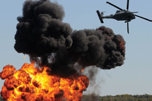 This is a photo of a helicopter and an explosion.