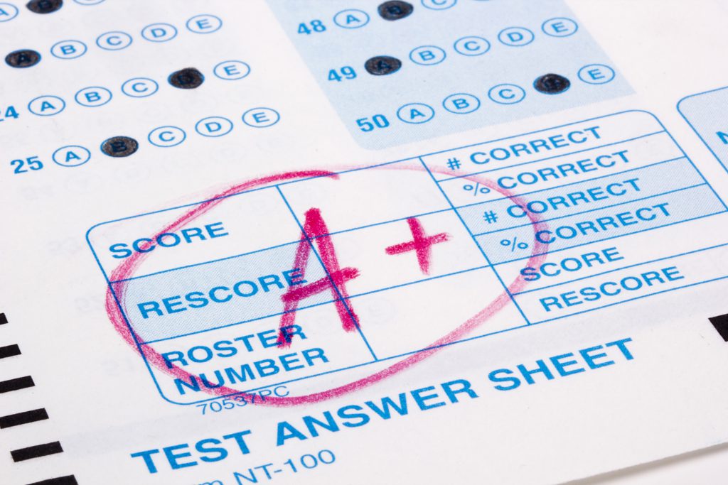 Close-up photograph of a perfect grade on a scantron test.