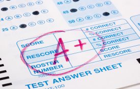 Close-up photograph of a perfect grade on a scantron test.