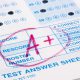 Close-up photograph of a perfect grade on a scantron test.