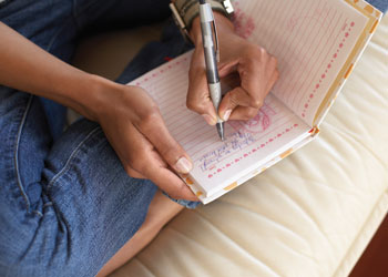 This is a photo of a person journaling.