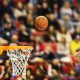 Scoring the winning points at a basketball game , motion blur