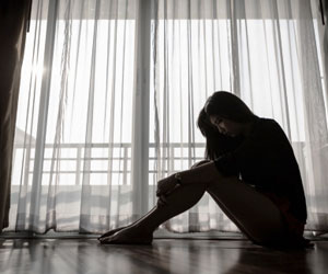 This is a photo of a woman who looks depressed.