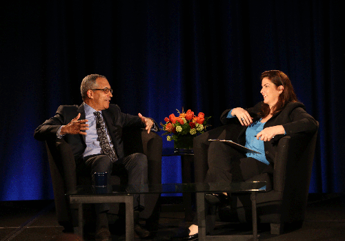 This is a photo of Claude Steele being interviewed by Elizabeth Phelps.