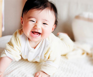 This is a photo of a smiling infant.