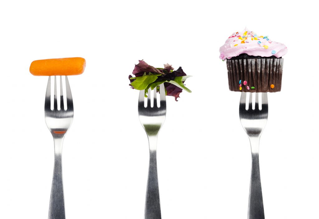 This is a photo showing forks with different food options