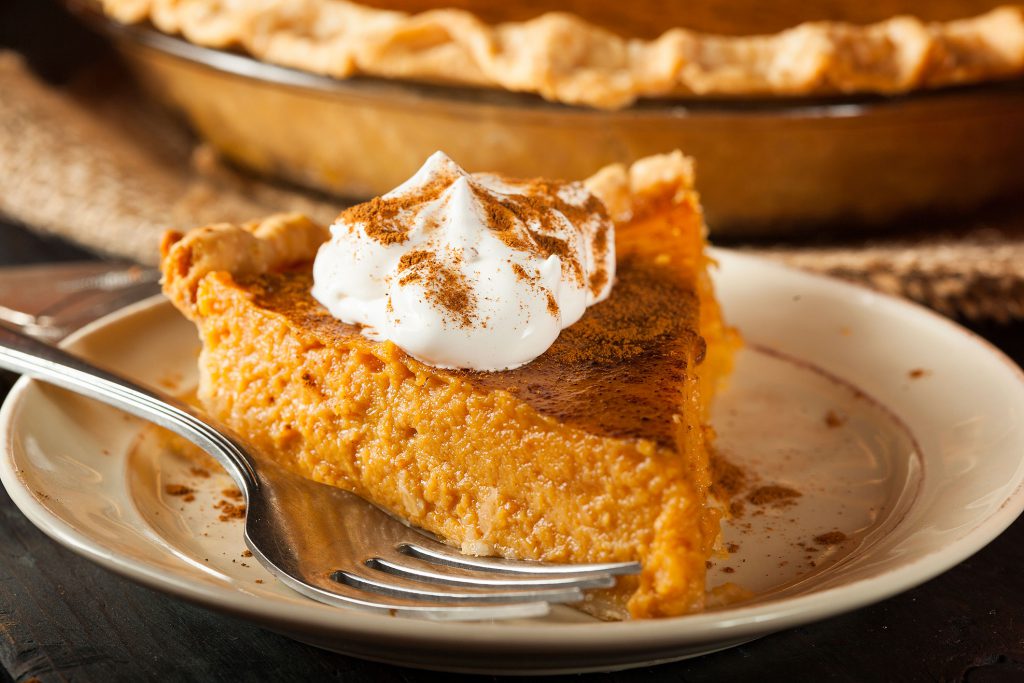 This is a photo of a slice of pumpkin pie.