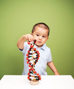 This is a photo of a child building a double helix.