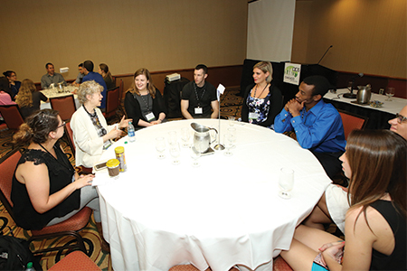 APS Past President Susan T. Fiske chats with students during the annual "Champions of Psychological Science" event.