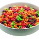 A picture of a bowl of fruity cereal.