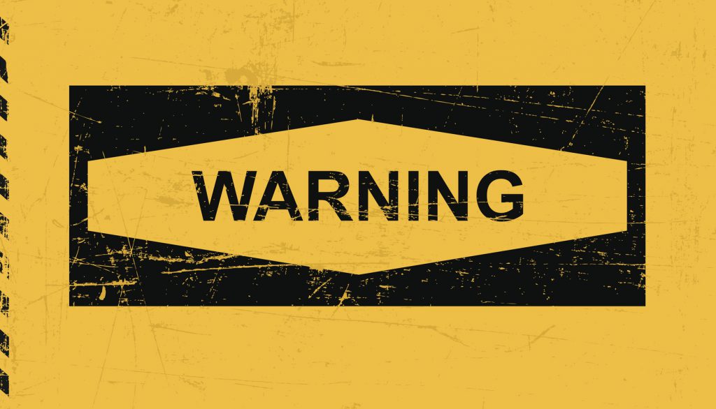 Warning sign banner on a yellow background
