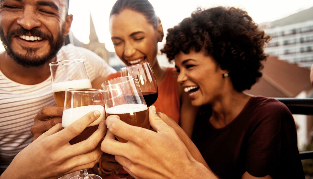 Photo of a group of friends enjoying drinks at a party