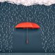 This is an illustration of a red umbrella blocking rainfall against a dark background