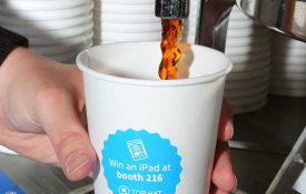 Attendee pouring coffee at a Sponsored Coffee Break at APS convention