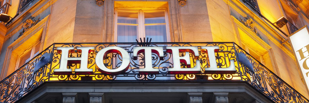 Illuminated hotel sign taken in Paris at night
