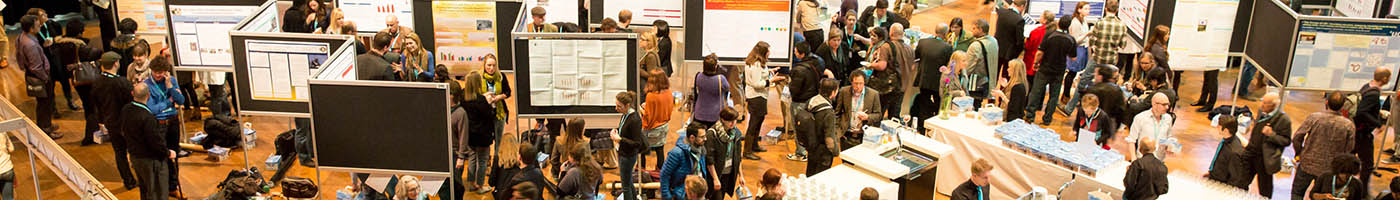 Convention Archive featured image of a poster session in full swing.