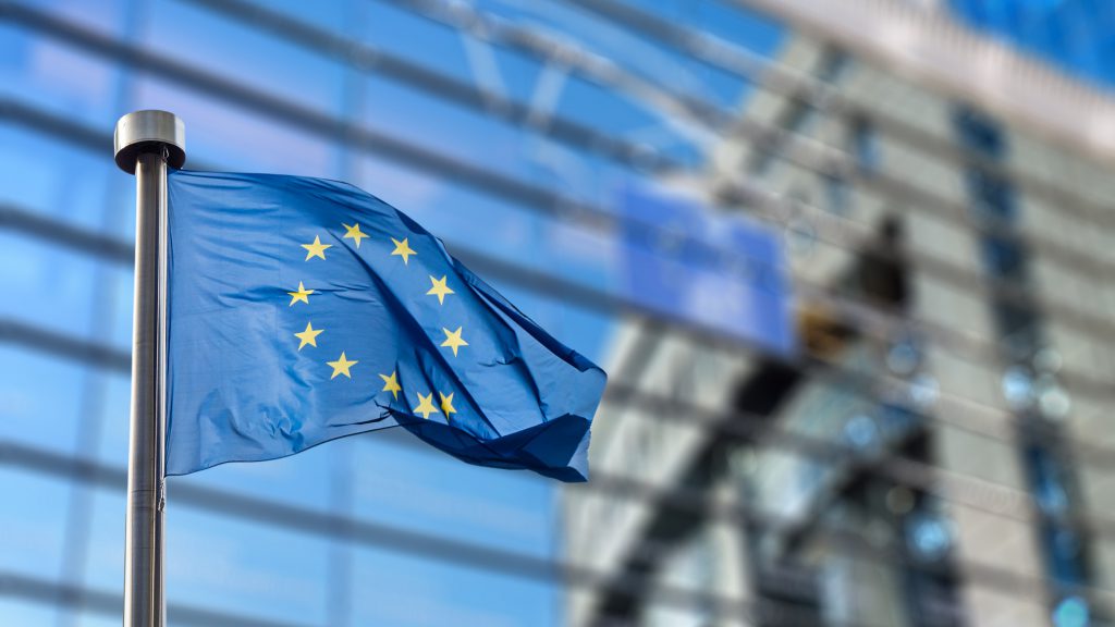 European Union flag against a building backdrop