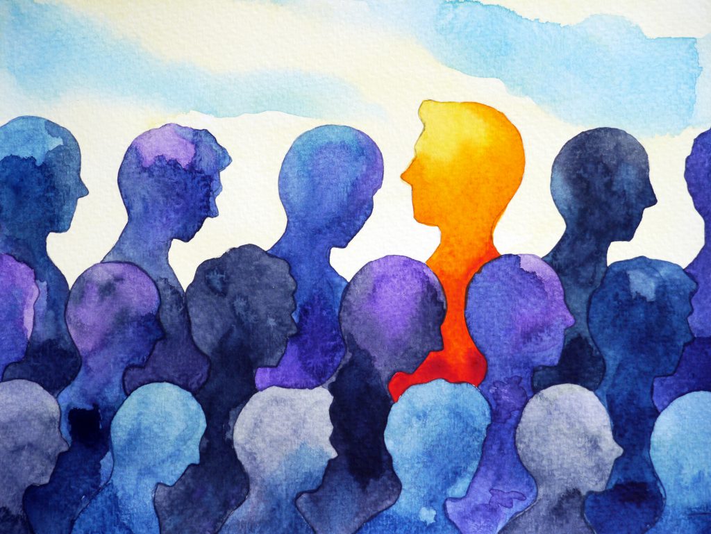 depression concept of watercolor image of blue silhouettes and one orange person that stands out