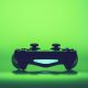 Video game controller on a vivid green background