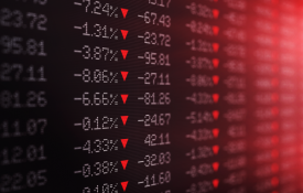 Photo of a stock ticker board showing losses