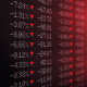Photo of a stock ticker board showing losses