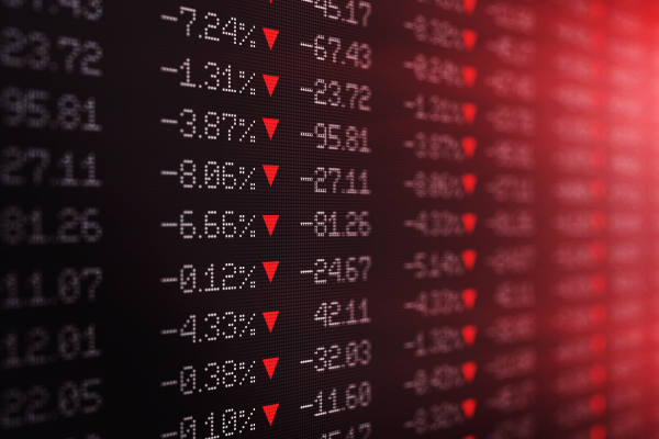 Photo of a stock ticker board showing losses