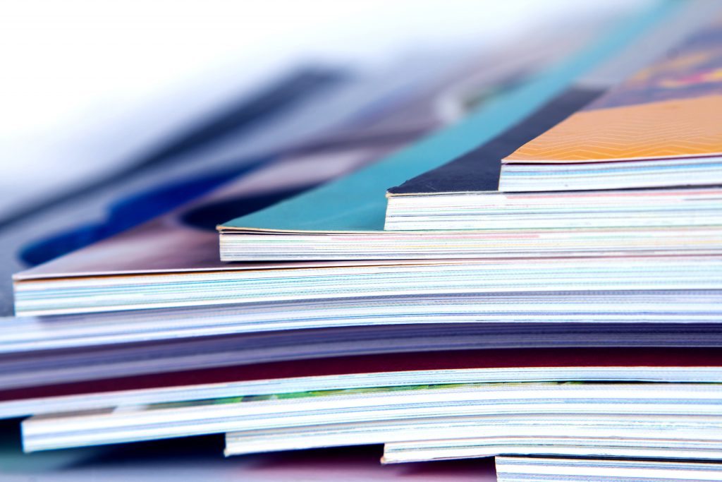 Stack of Books image representing APS Journals
