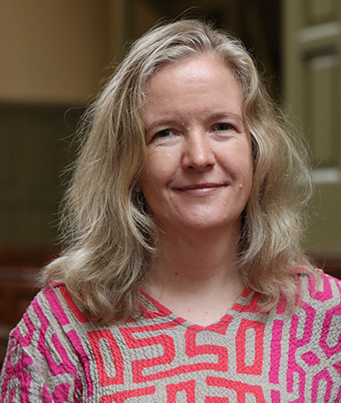 Headshot of Charlotte Vrijen.