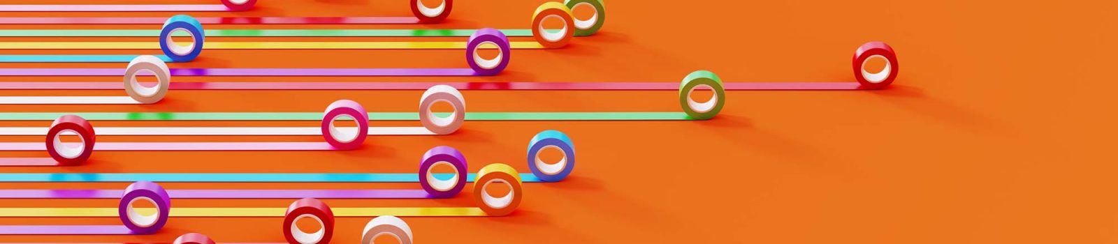 Rings racing on an orange background, with one clearly in the lead.