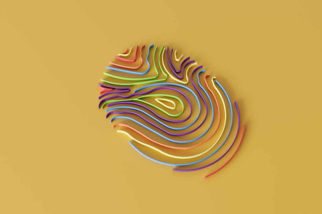 A multicolored fingerprint on a yellow background.