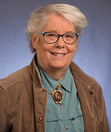 Headshot of Linda Woolf.