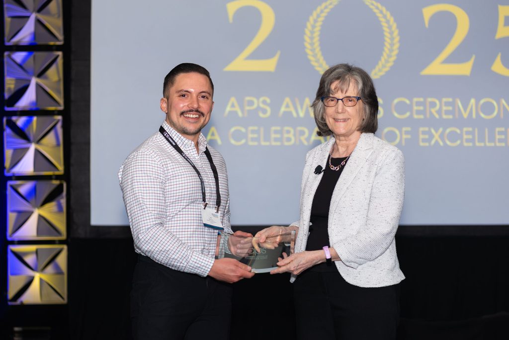 Spence Award recipient Juan Del Toro holds his glass award while standing next to Randi Martin during the Awards Ceremony.