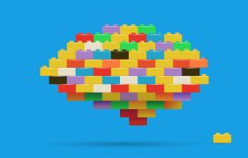 Illustration of colorful building blocks shaped into a brain.