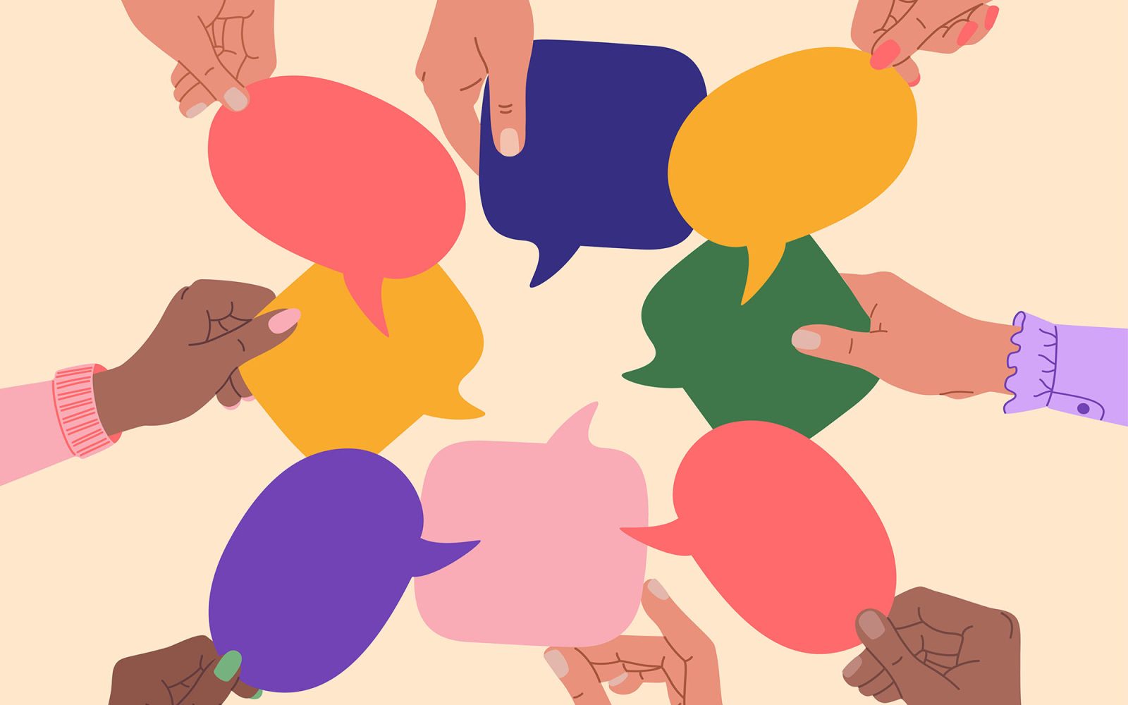 Diverse human hands holding speech bubbles.