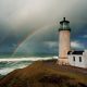 Double Rainbow stands out in the stormy rainy skies above North Head Lighthouse at the mouth of the Columbia River and the Pacific Ocean in IIwaco, Washington.