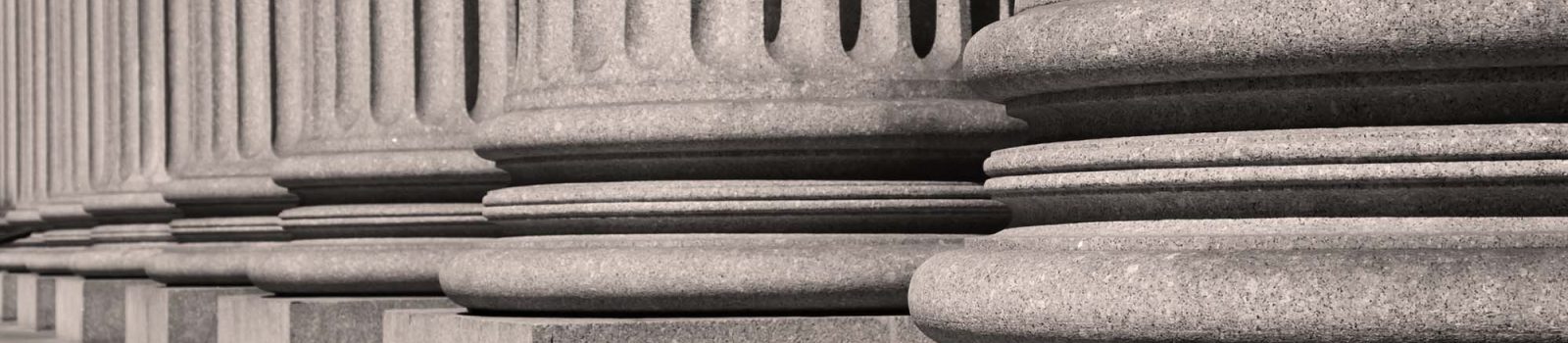 Closeup of government building pillars.