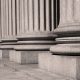 Closeup of government building pillars.