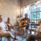 Group of seniors playing guitar.