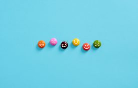 Small emoticons showing different emotions on a blue background.