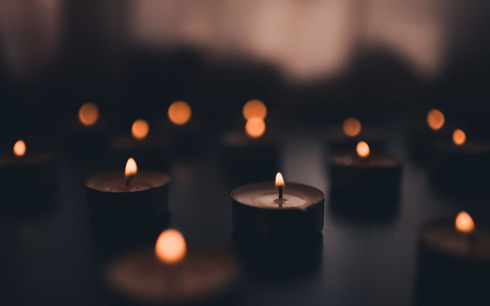 Closeup of memorial candles.