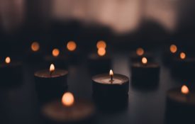 Closeup of memorial candles.