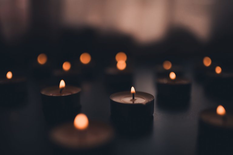 Closeup of memorial candles.