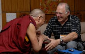 Paul Ekman and HH Dalai Lama laughing together.