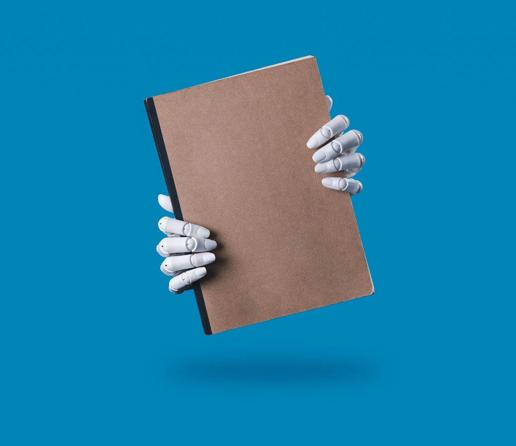 Robot Hands Holding a Blank Brown Notebook