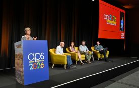 Pamela Davis-Kean speaks at a podium during the APS 2026 convention.